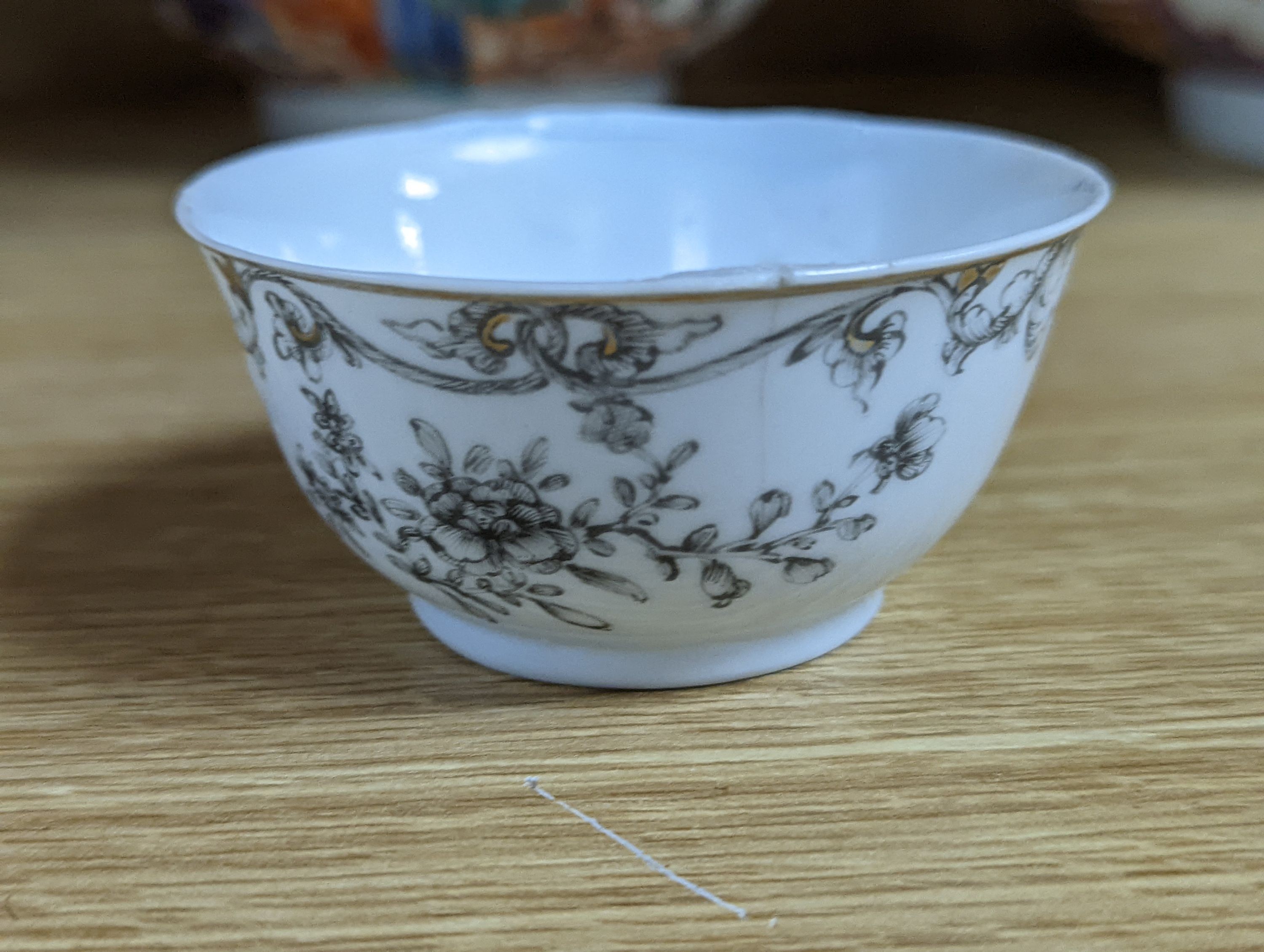 Two 18th century Chinese export bowls, a similar tea bowl and another Chinese blue and white tea bowl, largest 20cm diameter